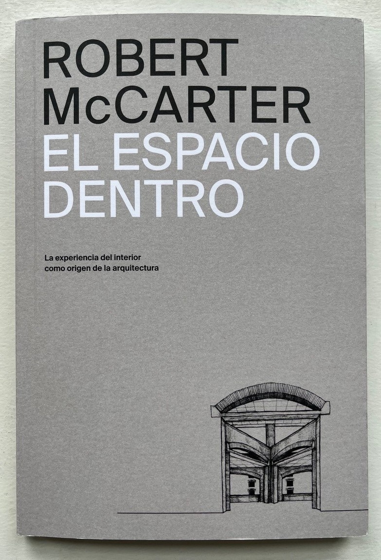 book cover for the Spanish translation of "The Space Within". The text is large and all capital letters in black and white on top of a gray background