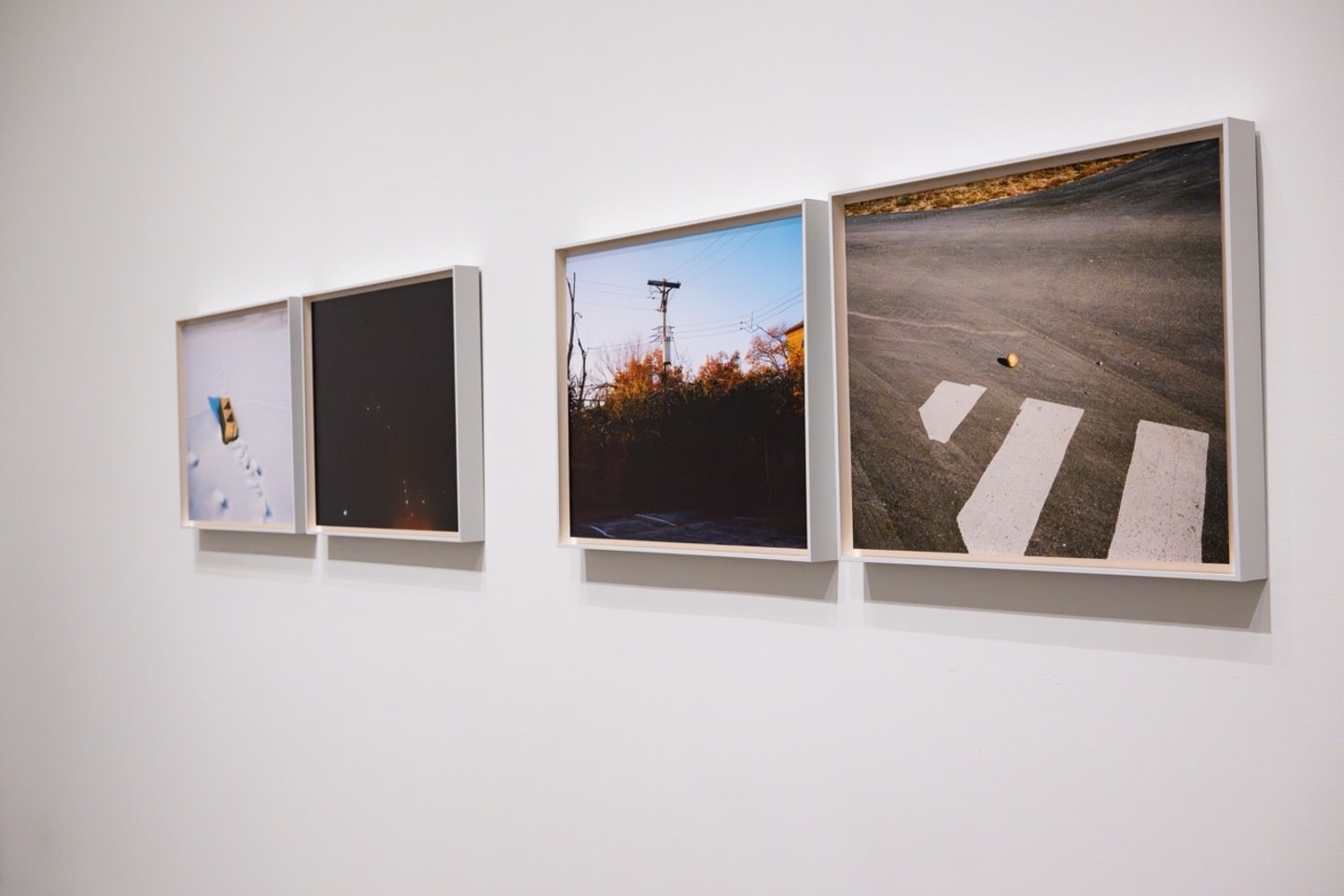 four frame photos are a gallery wall
