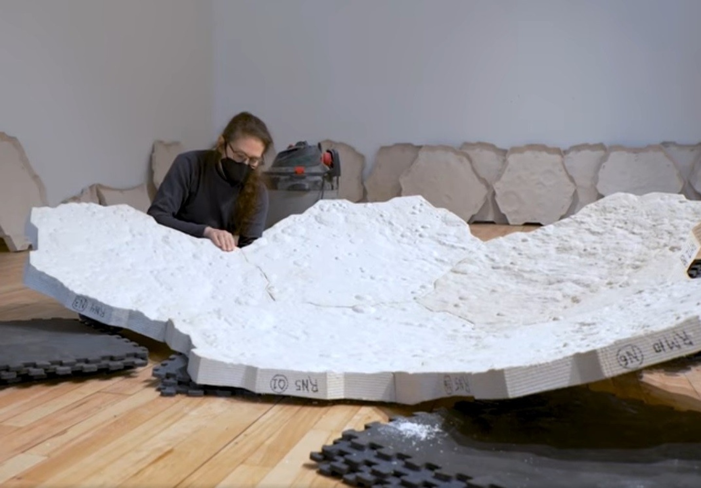 Amy Hauft working on a sculptural installation.