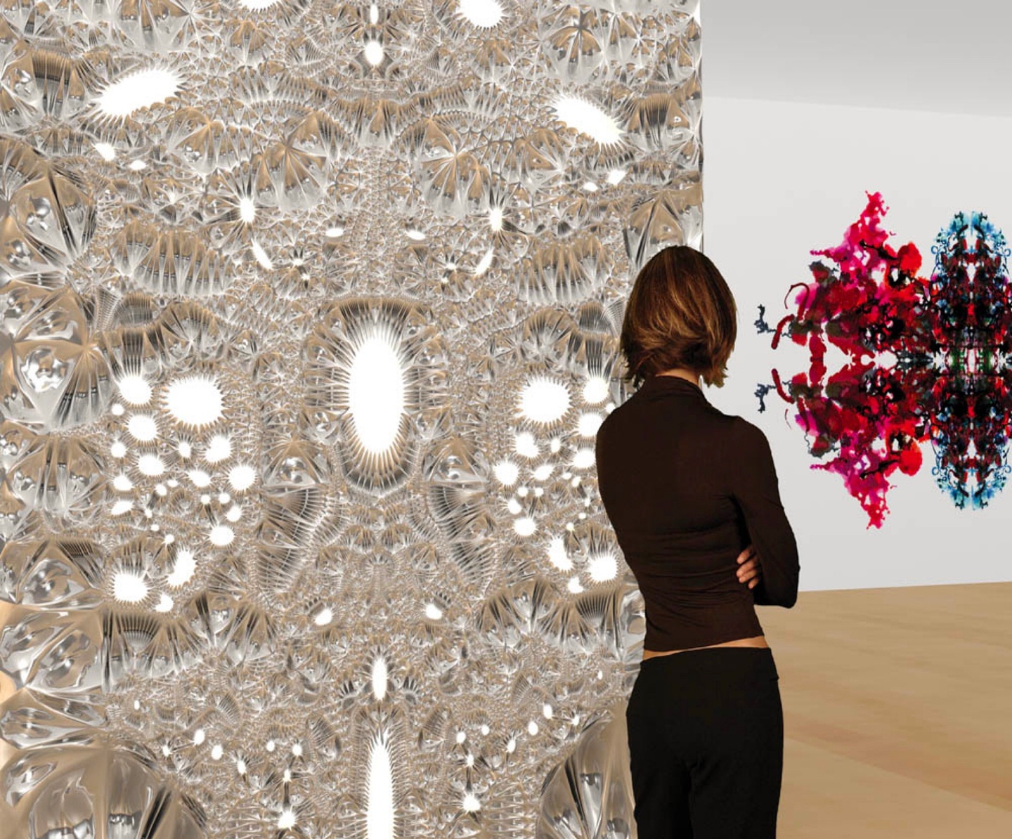 Installation of a large-scale, fabricated tesselation pattern in all white, with a person standing in front of it and artwork on the back gallery wall.