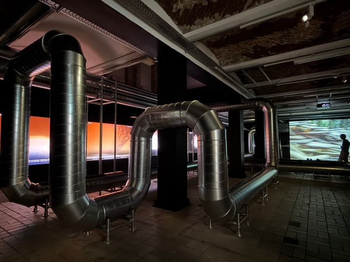 interior space with exposed pipes