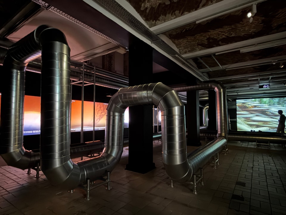 interior space with exposed pipes