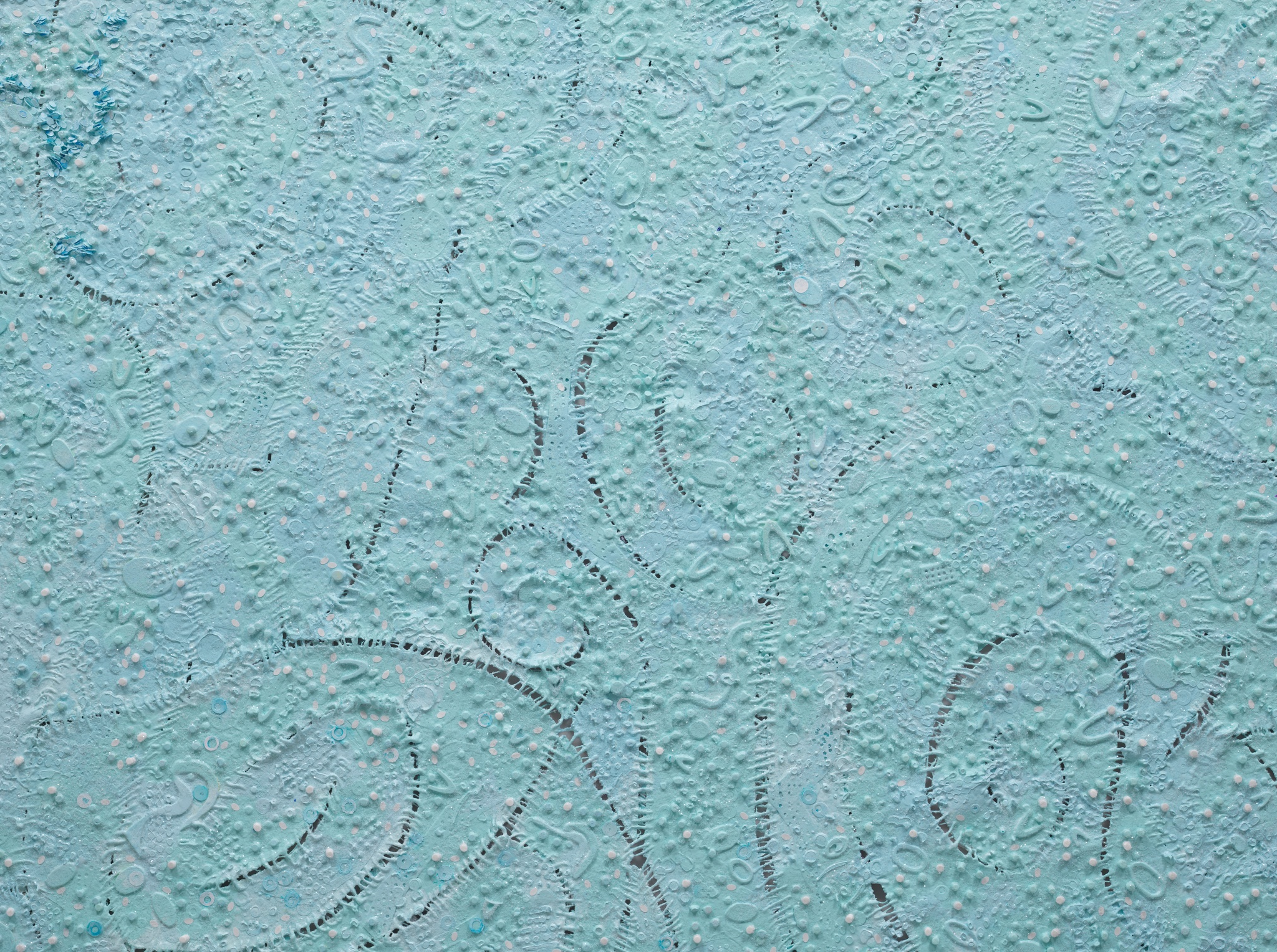 A close-up image of a blue-green abstract canvas with sutures and other elements on its surface