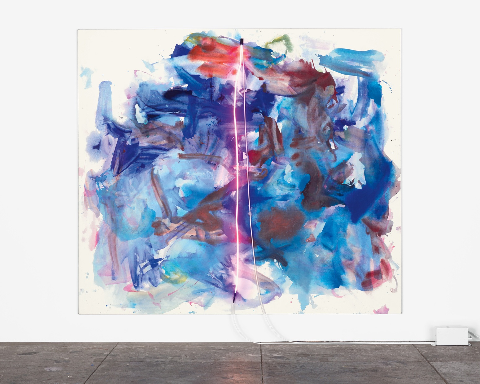 A large, abstract, blue and red painting with a pink, neon tube across the center of the canvas.