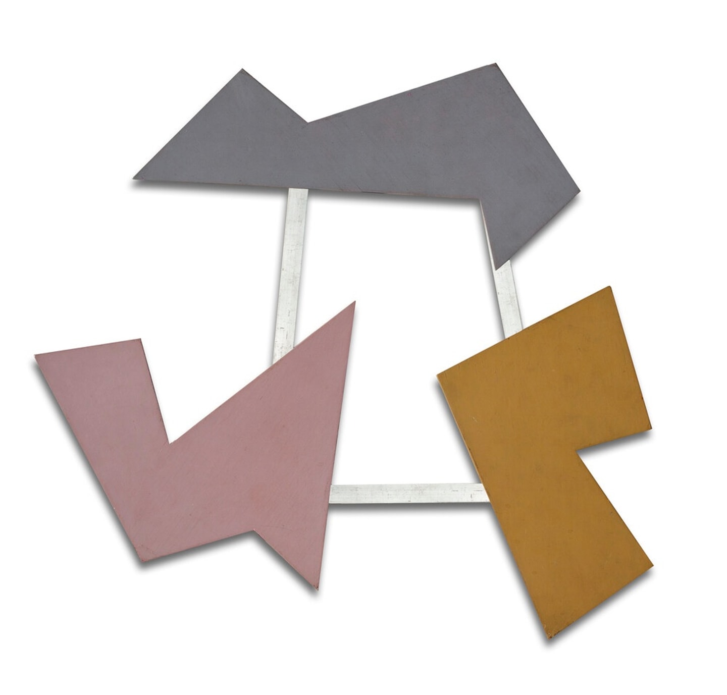 Raúl Lozza’s abstract composition consists of three irregular geometric forms in muted pink, gray, and ochre, suspended within a white open framework. The angular forms overlap the framework, creating an asymmetrical arrangement of shapes and lines.