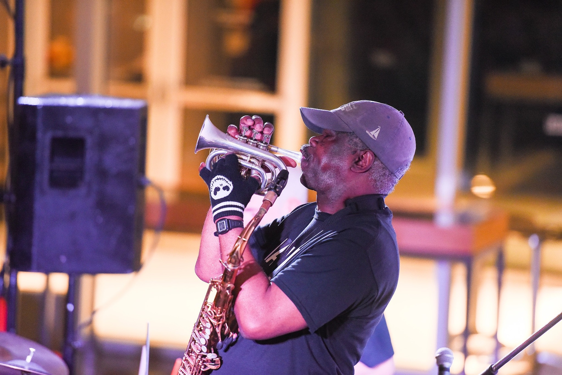 Photo of a man playing the saxophone.