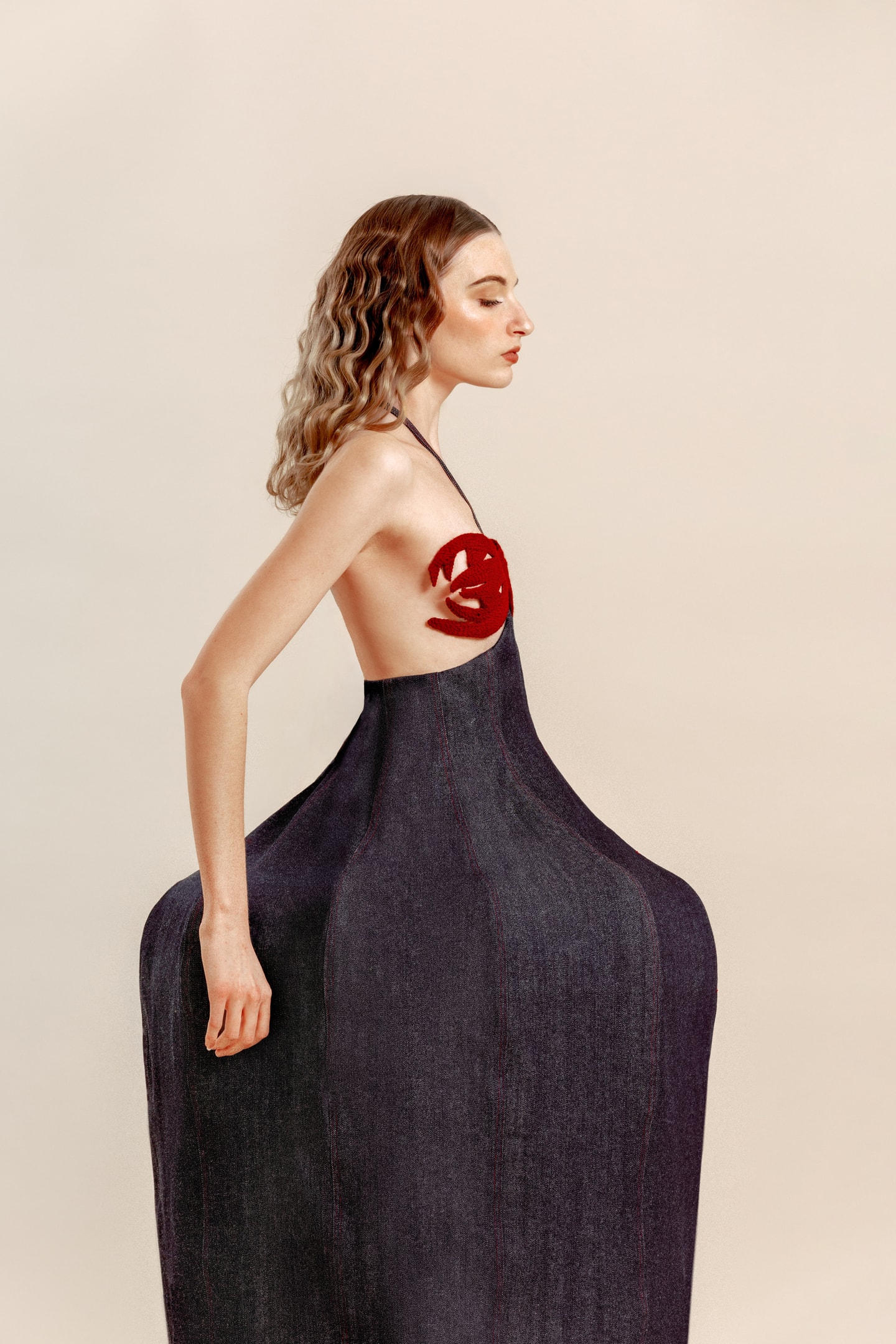 model standing in a black and red dress