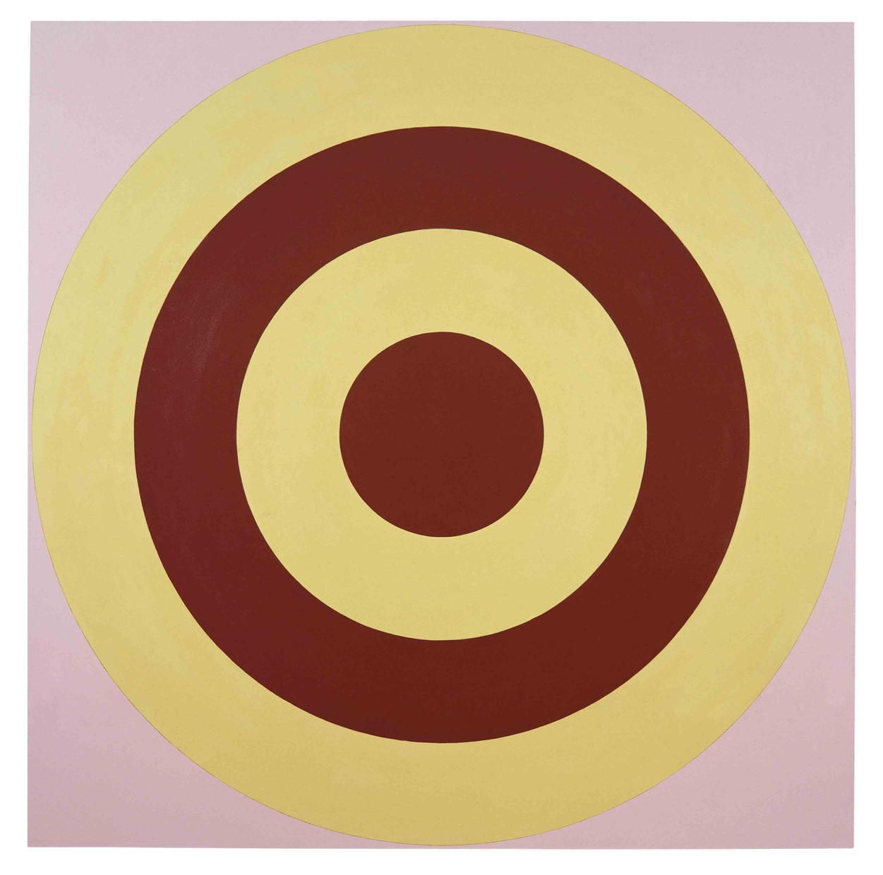 A red target painted on a yellow circle with a pink background.