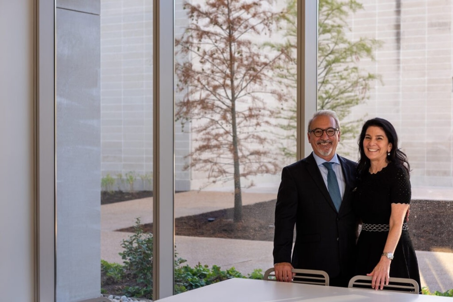 photo of Carmon Colangelo and Vicki Match Suna standing next to each other in Weil Hall