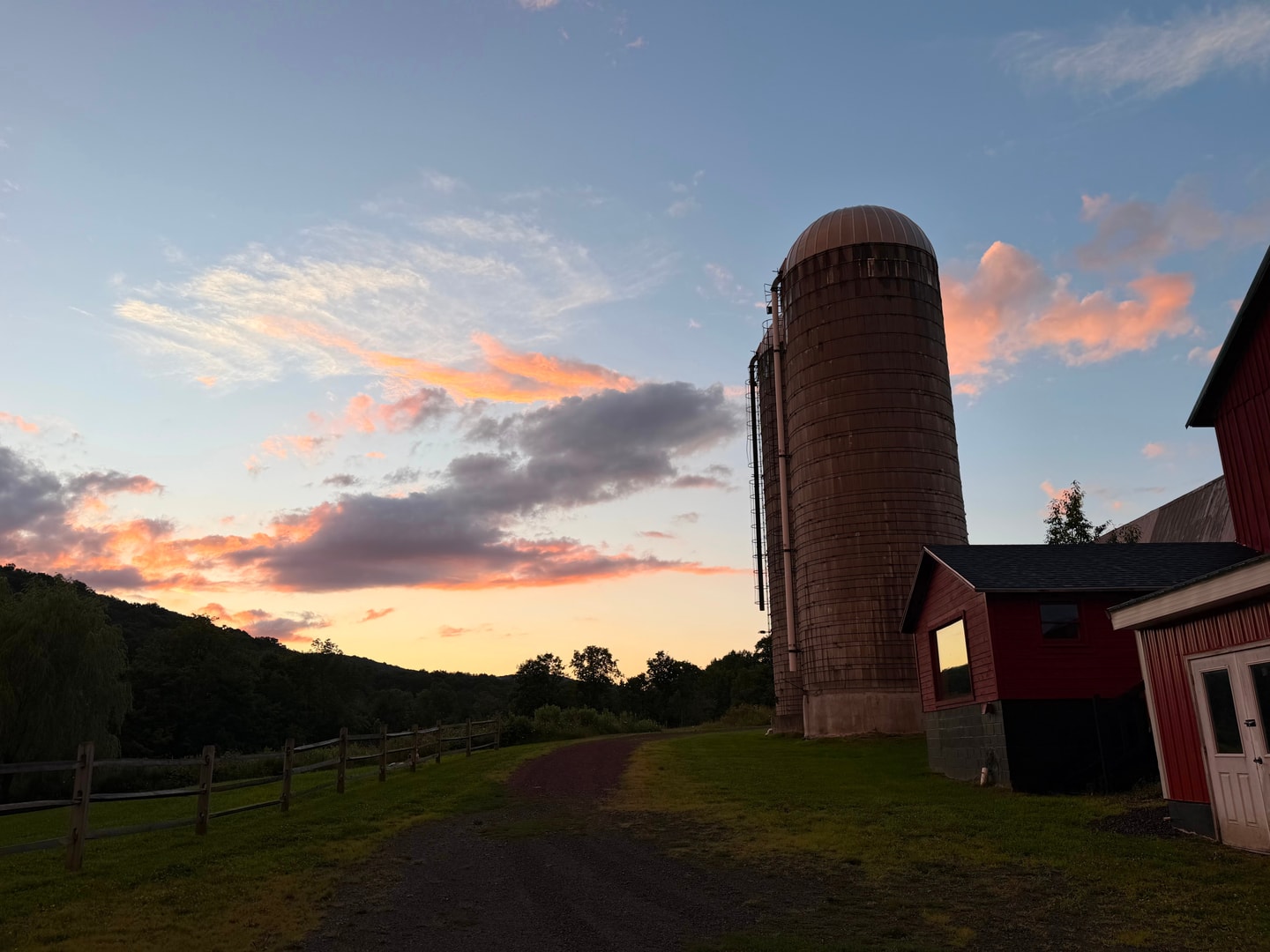a barn at sunrise