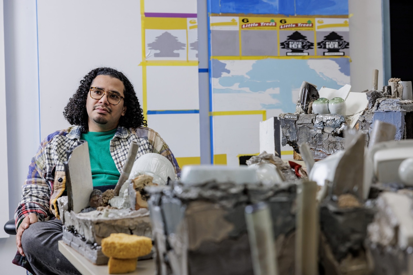 Man sitting in artist studio