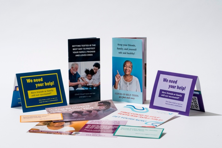 Arrangement of health-related brochures and cards.