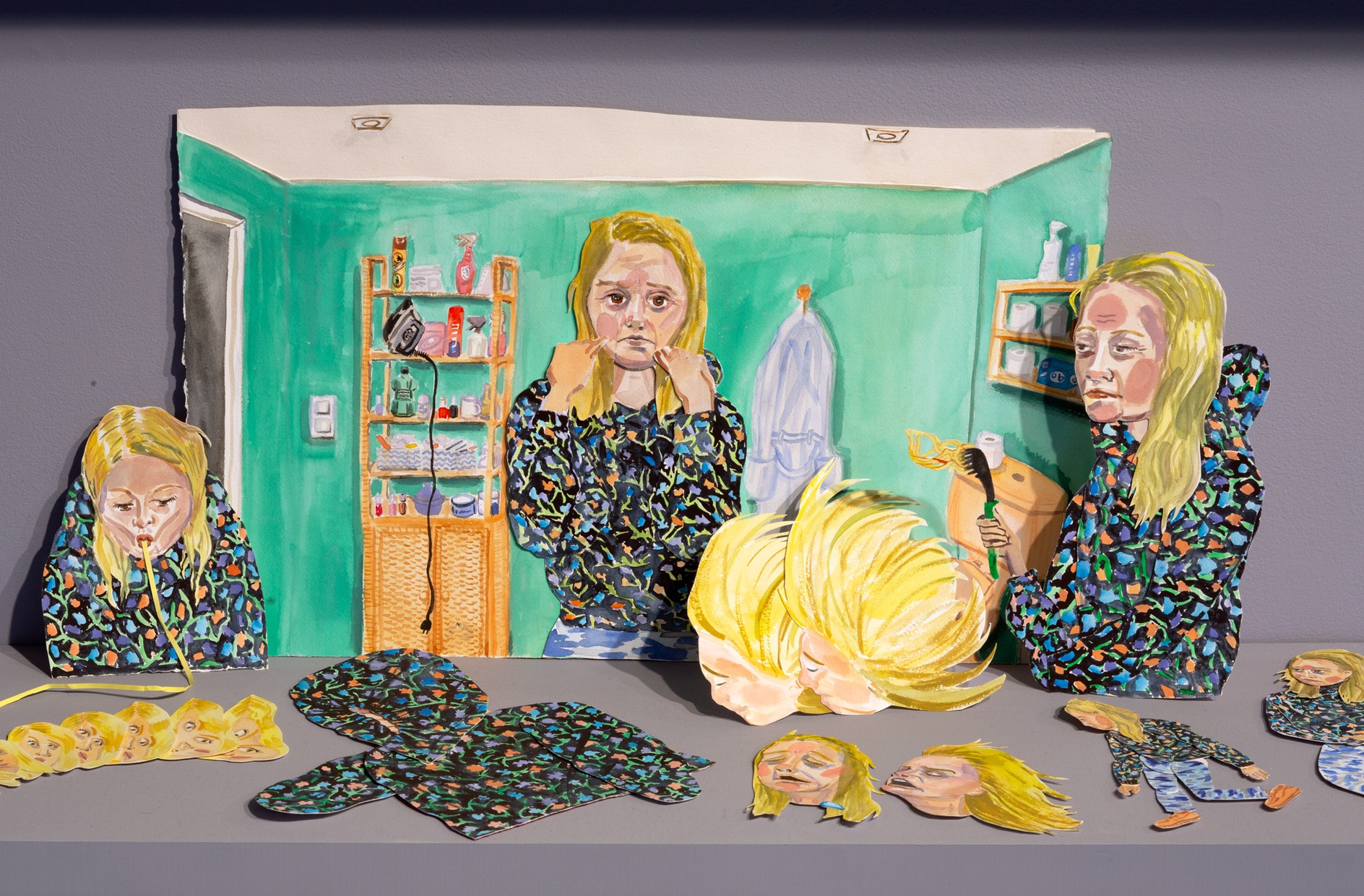 A painted watercolor scene of a blond woman in a bathroom with additional painted cutouts of the same woman leaning against and below it.