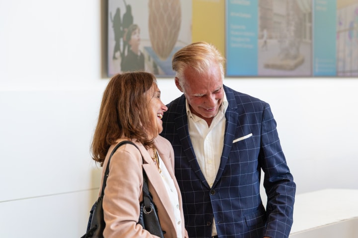 A man a woman in conversation