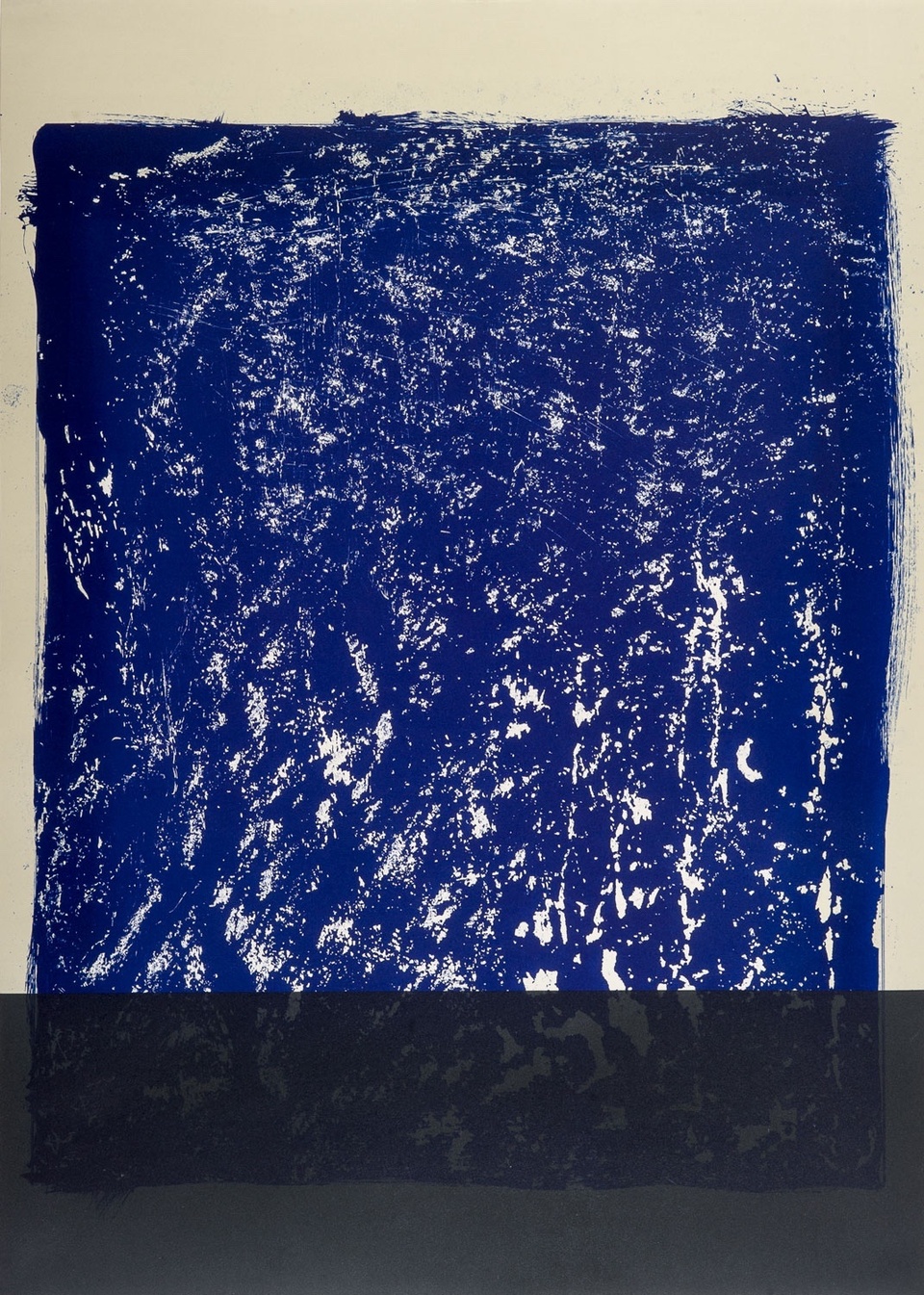 Image of ultramarine blue rectangle submerged in a dark grey/black rectangle 