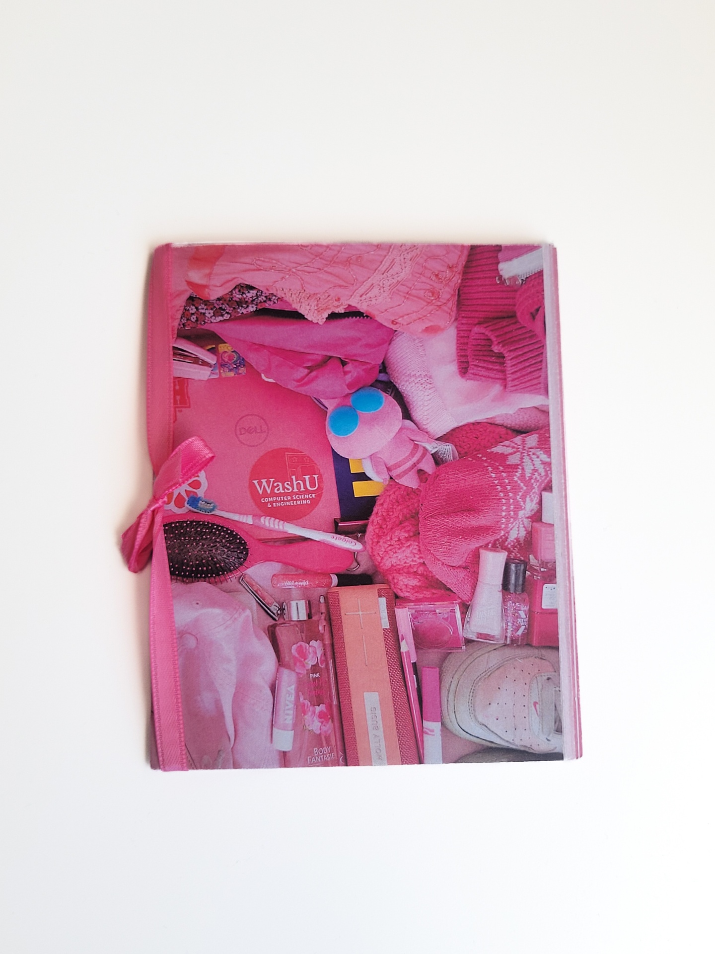 A pink book cover comprised of an image of several pink items