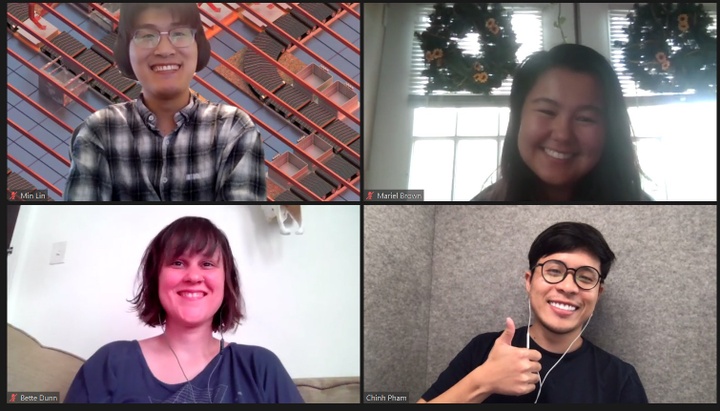 Screenshot of 4 Zoom participants, all smiling and one including a thumbs up.