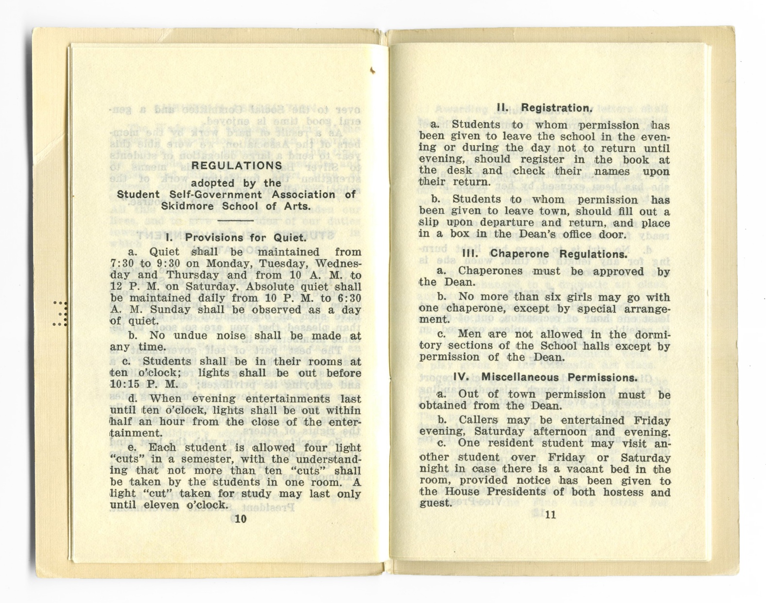 A yellowed spread from the 1916-17 Students’ Handbook is opened to page 10 and 11. The top of the left page reads “Regulations” with sections 1-4 marked in Roman numerals.