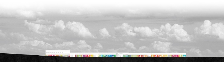 An elevation of a school building with colored classroom spaces.