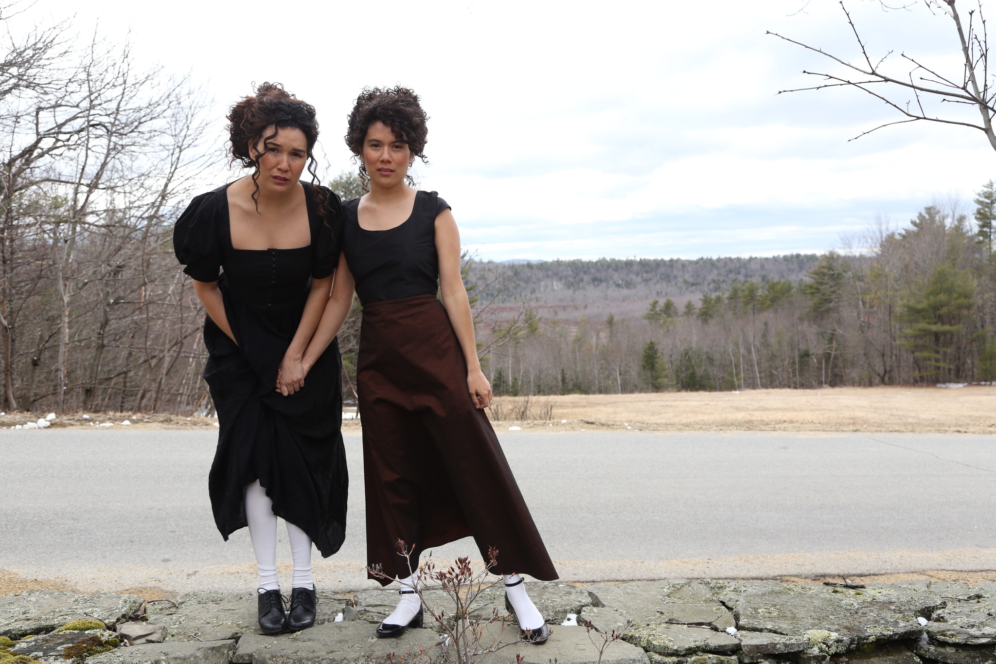Maia and Zoe Chao standing in a production photo from Open Call artist Maia Chao's video work What Draws Us Together, What Drives Us Apart