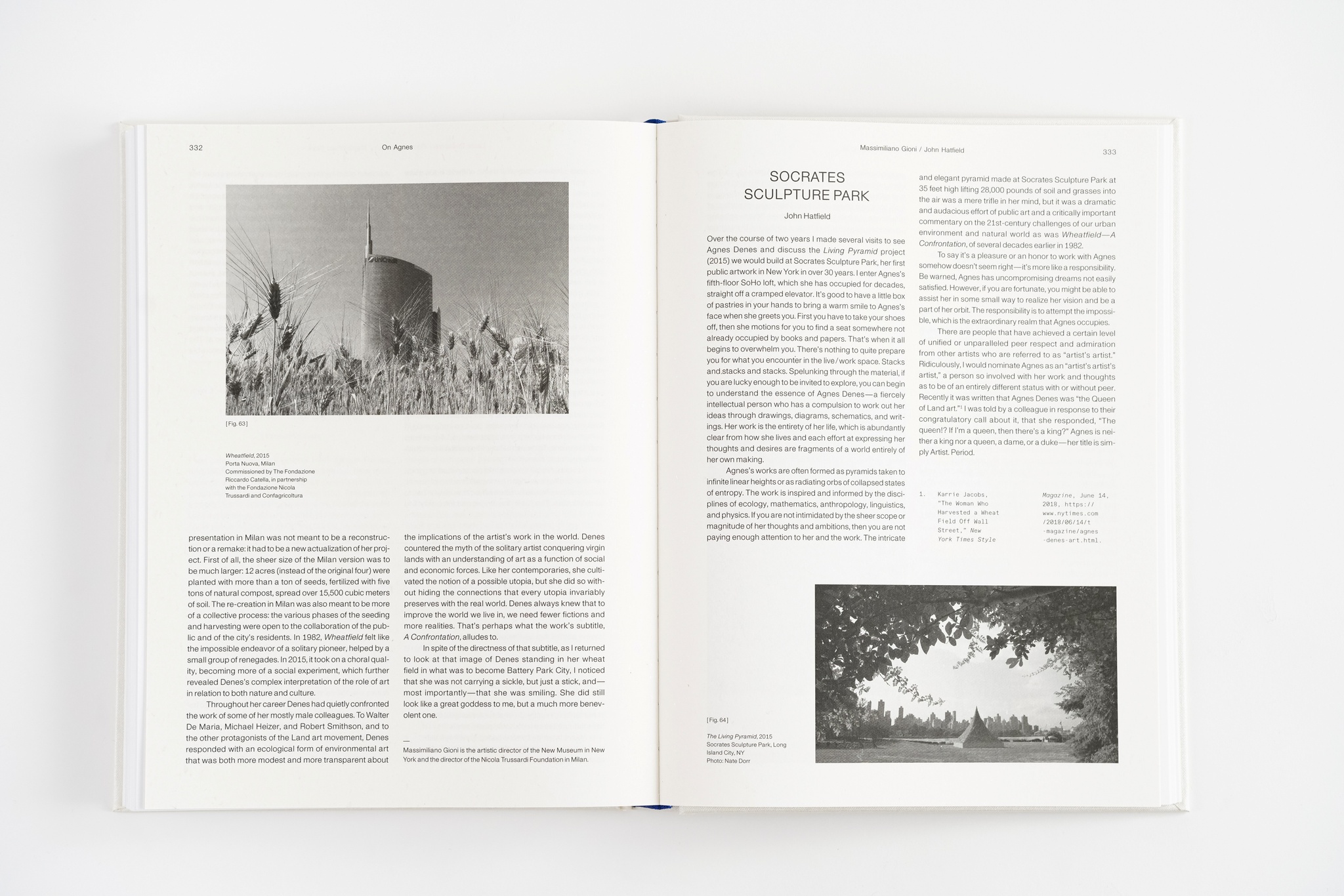 An interior spread of an exhibition catalogue displaying an essay with an image of a wheatfield