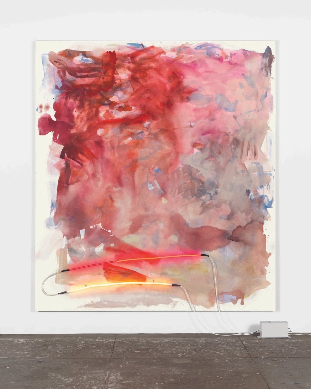 A large, abstract red painting with a yellow neon tube attached on the bottom left.
