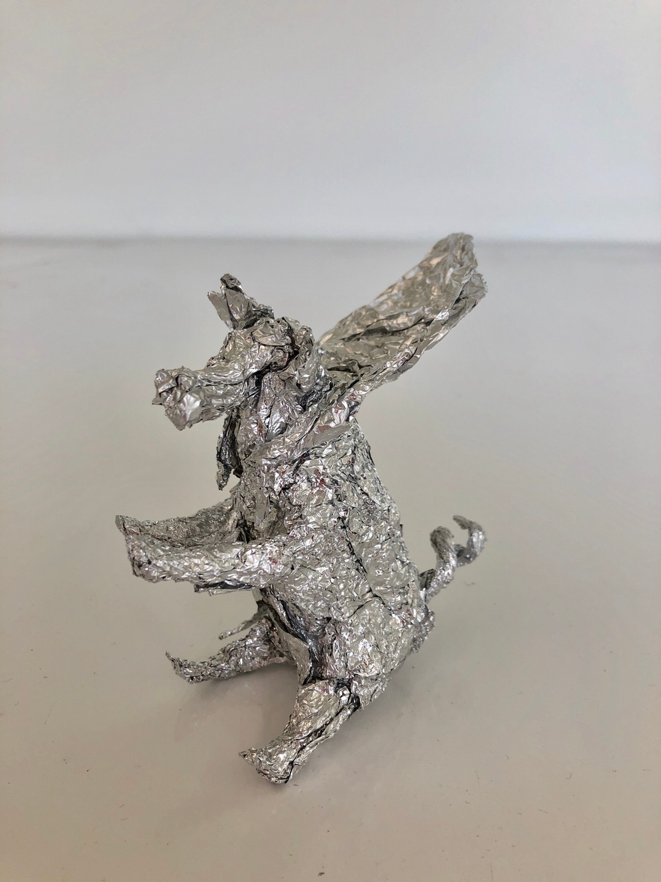 Little sculpture made from aluminum foil