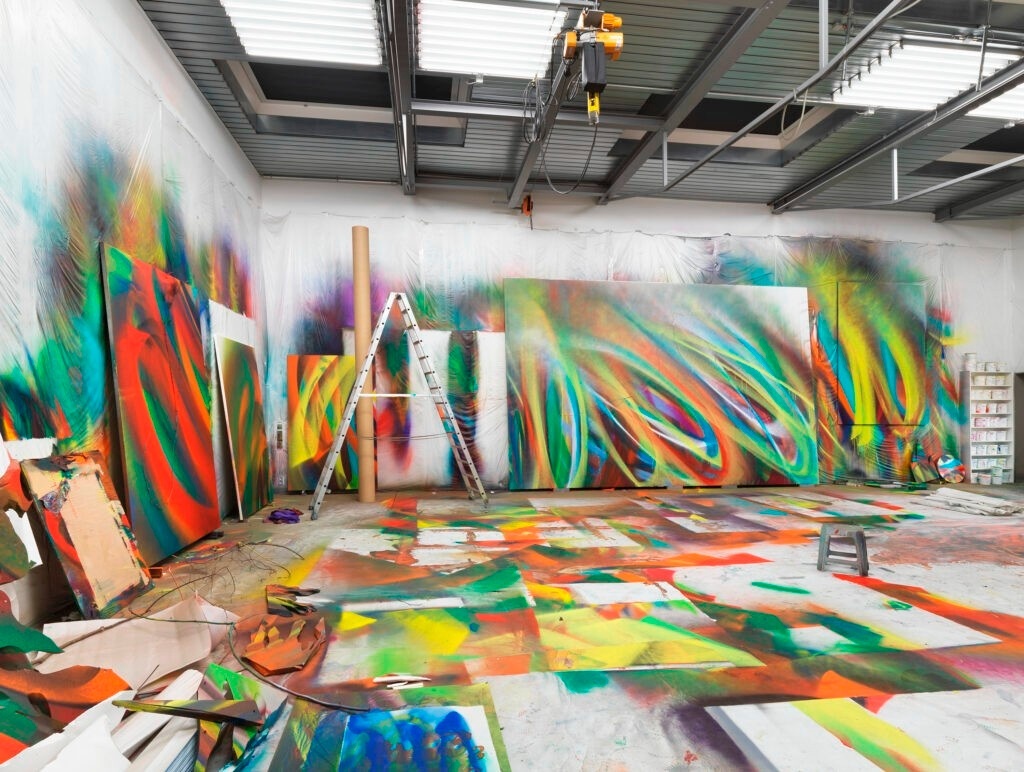 View of studio with large abstract paintings 