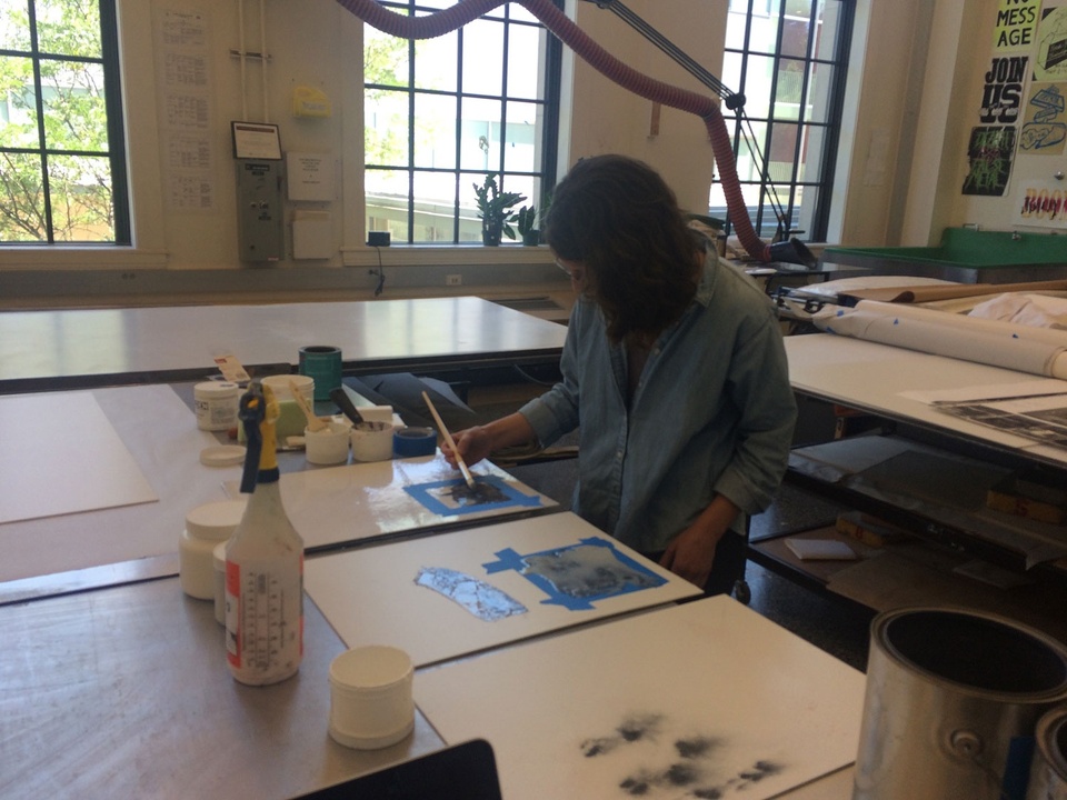 Artist Leah Beeferman working on printing plate