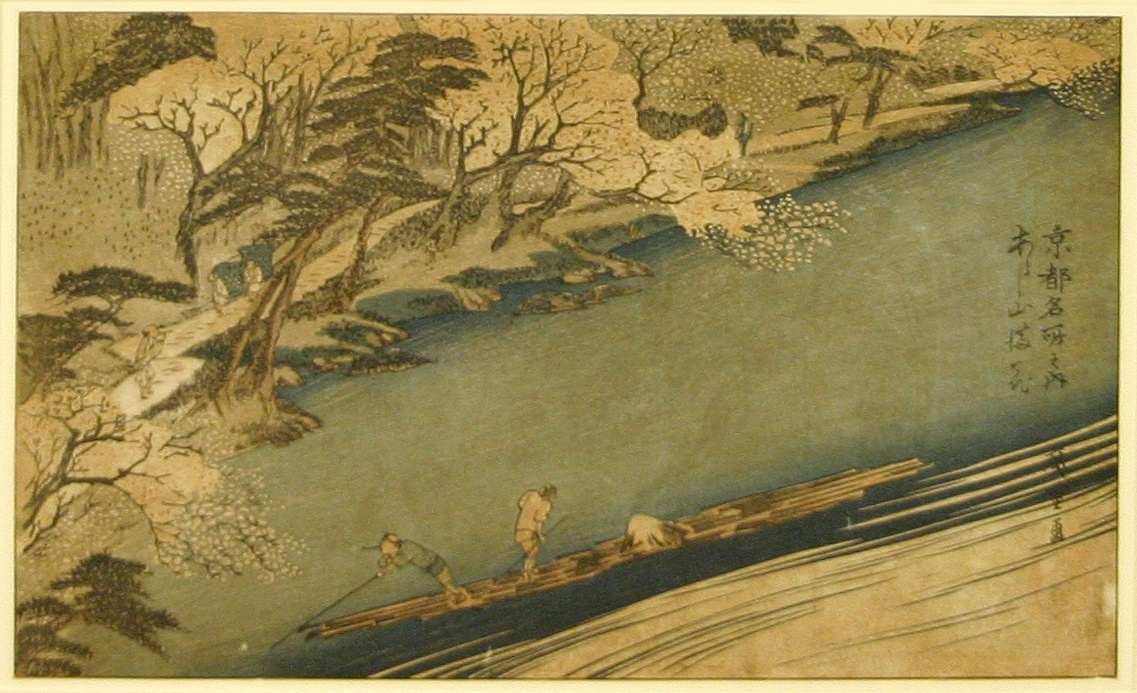 Woodblock print of an overhead view figures in a canoe in a river, with cherry blossoms in the foreground
