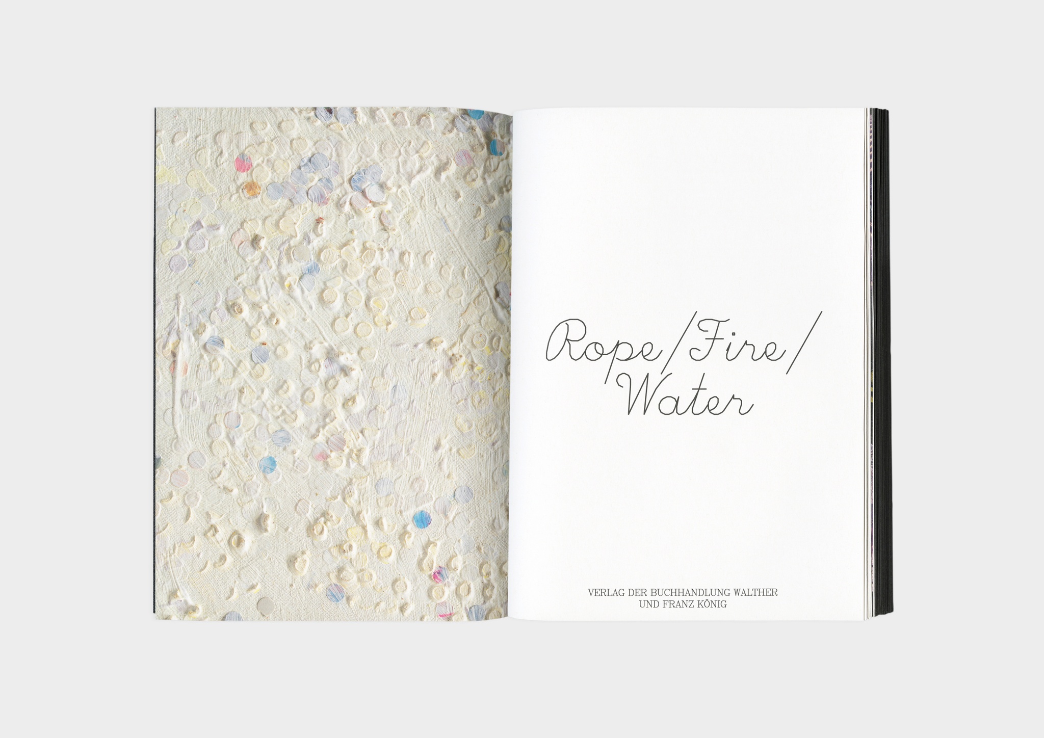 The title page spread of the catalogue "Howardena Pindell: Rope/Fire/Water". On the left is a full-bleed detail image of a white abstract painting with multicolored dots. On the left is the book's title and publisher name.