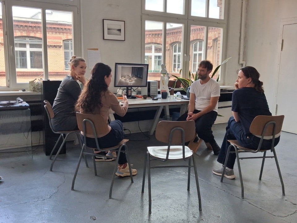 students gathered around with a curator in Berlin
