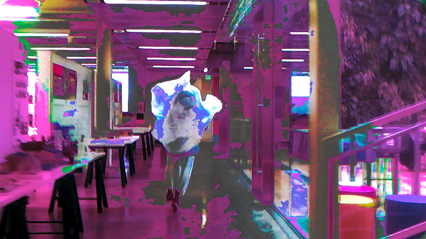 image of a person walking down a hallway