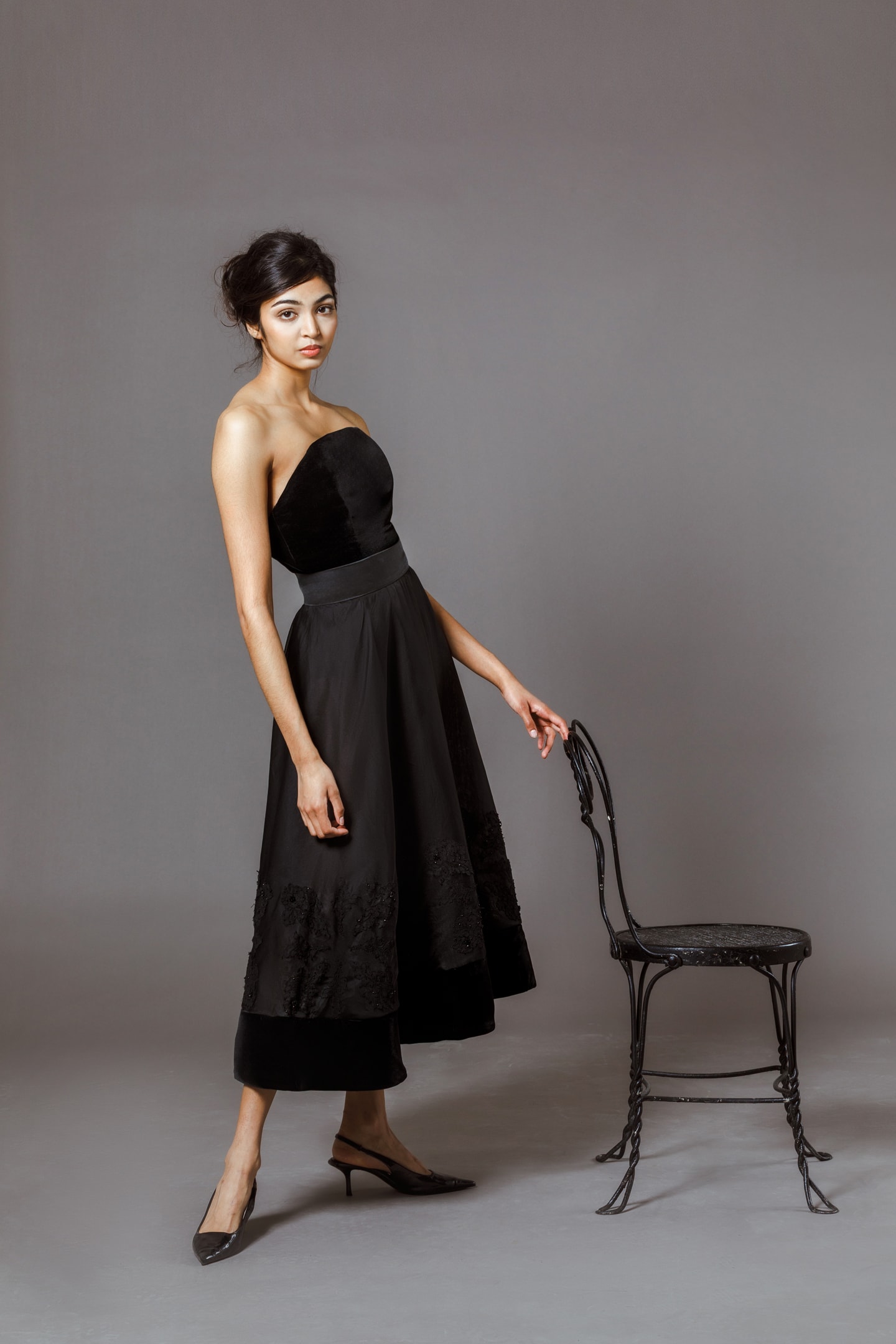 woman in black strapless dress