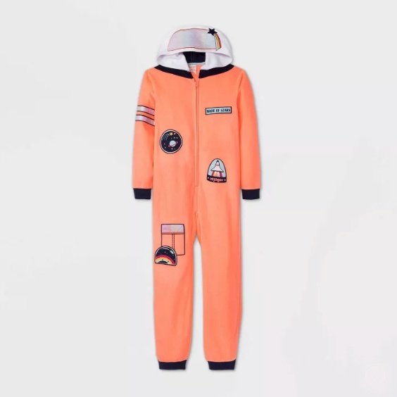 Orange fleece onesie pajamas with a hood, with decorative NASA patches.