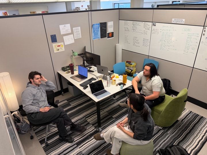 students in a cubicle