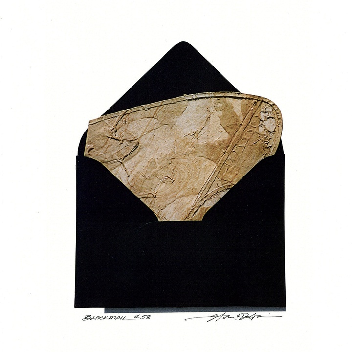 An open black envelope revealing a textured piece of light brown/beige paper sticking out, with a rounded top.
