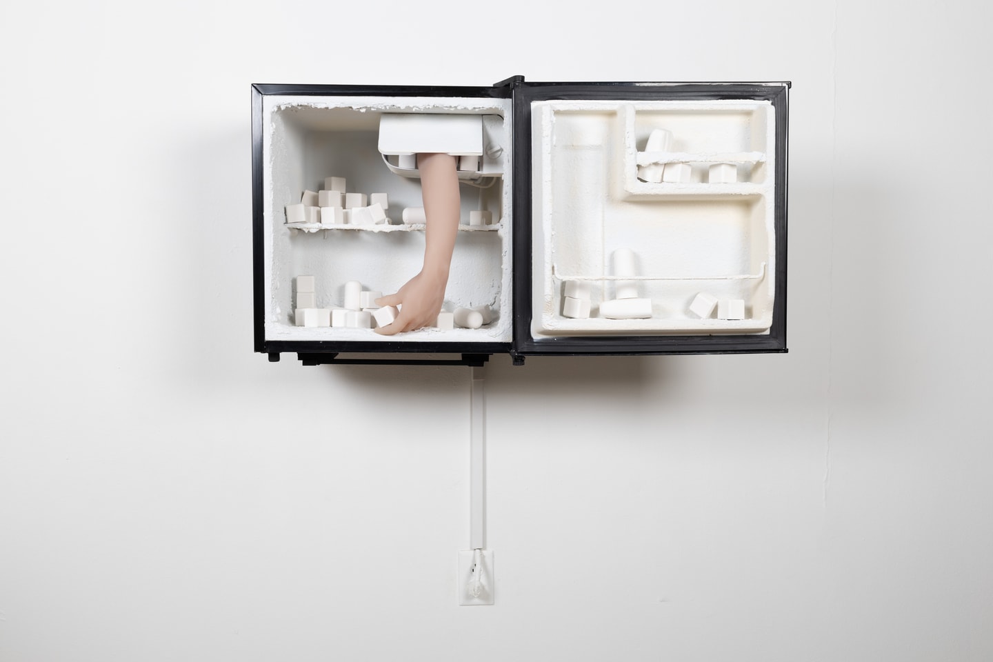 a hand inside a box