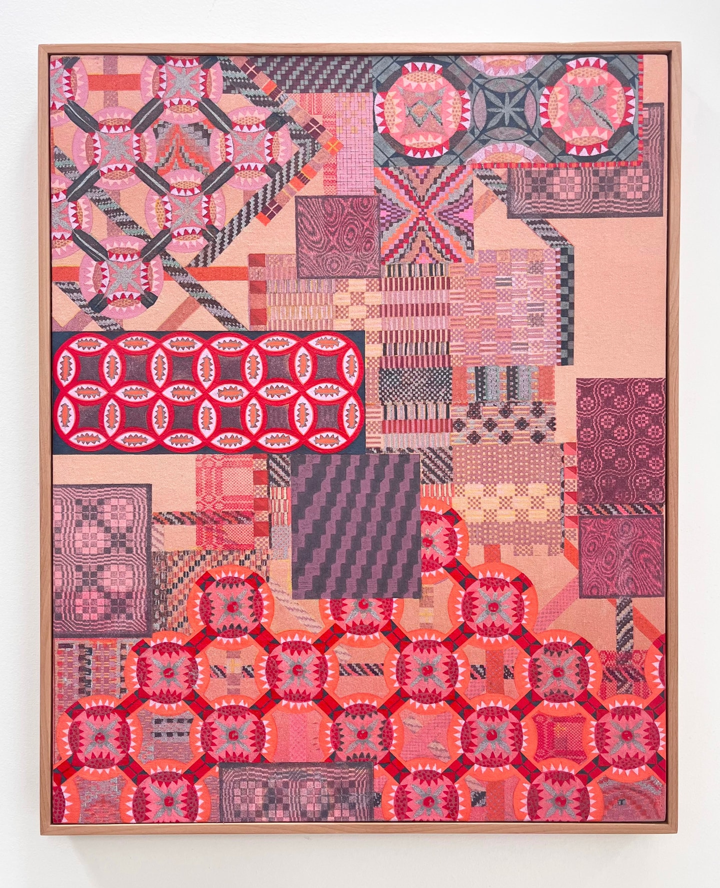 abstract quilt like pattern in reds and pinks