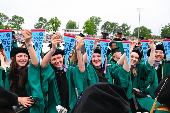 Students in regalia at commencement ceremony