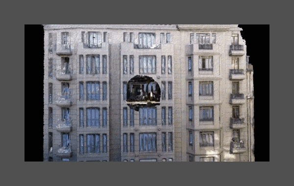 A reference gif of a viewer penetrating through the exterior walls of a building through several layers to the atrium of the building