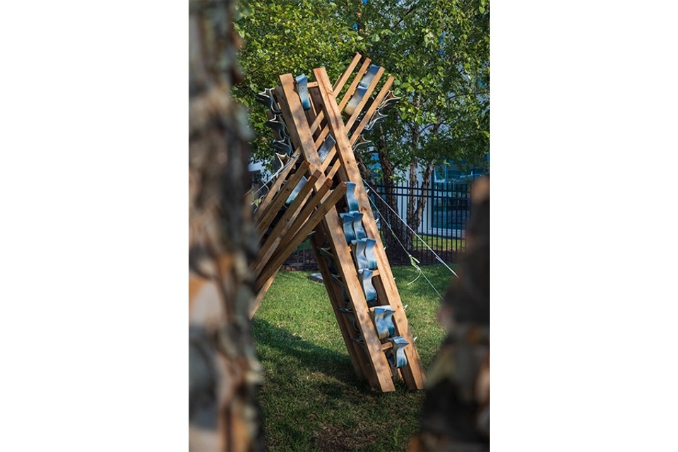 Detail of wood and ceramic sculpture