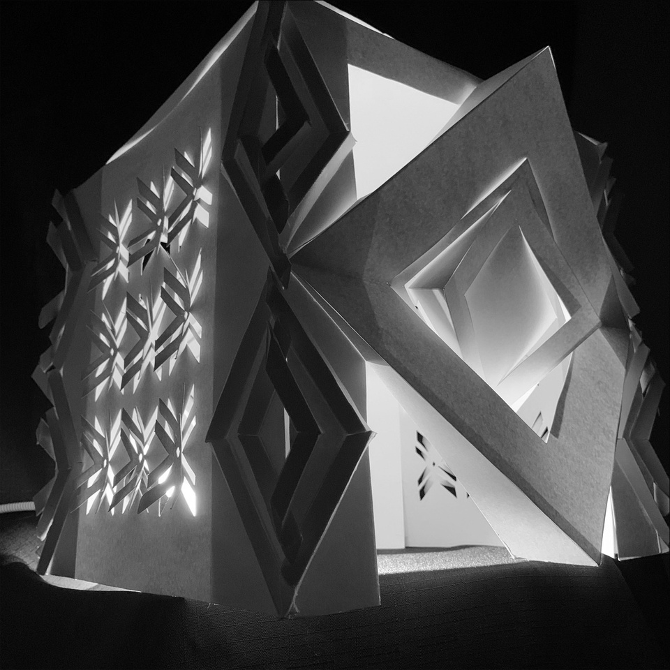 Geometric paper sculpture lit from within