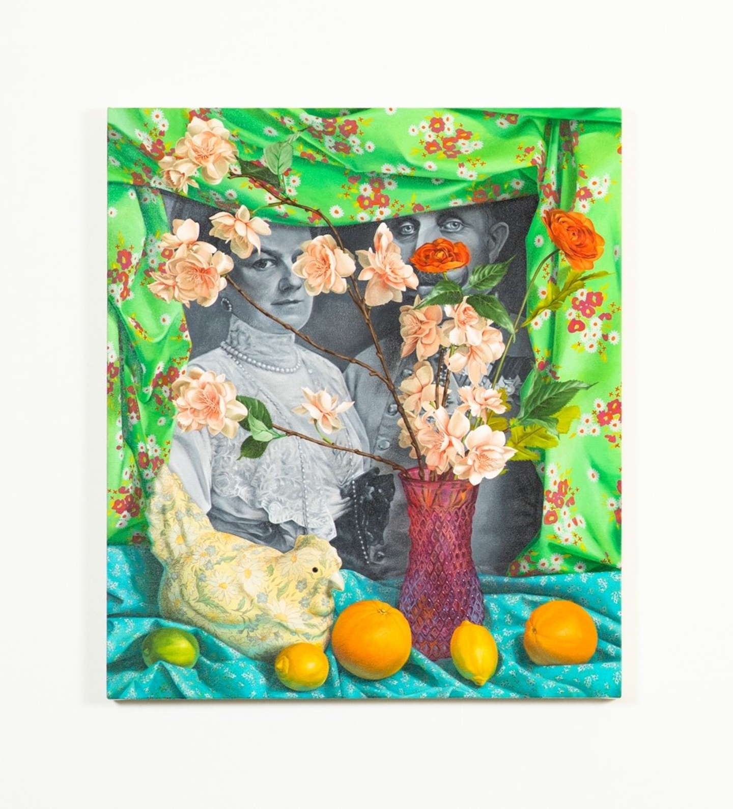 Trompe l'oeil style painting of a black and white photograph of a couple in historical garb, encircled by a piece of bright green fabric and fronted by a ledge set with a a teal tablecloth, a porcelain chicken statuette, a pink vase of roses, and a couple pieces of citrus fruit.