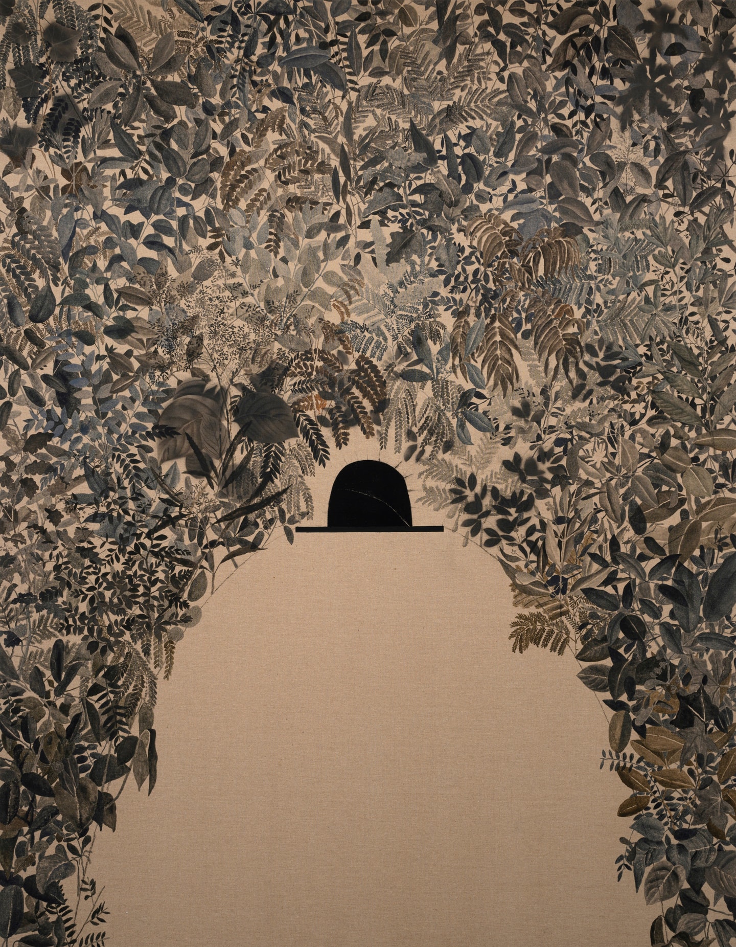 a single black hat surrounded by leaves in sepia tone