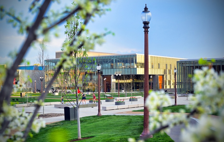 Wide shot of the Sam Fox School campus in springtime.