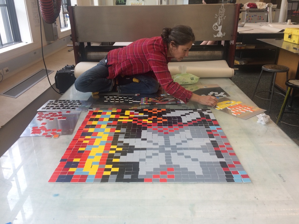 Lisa Anne Auerbach on the press placing tiles for printing Snowflake.