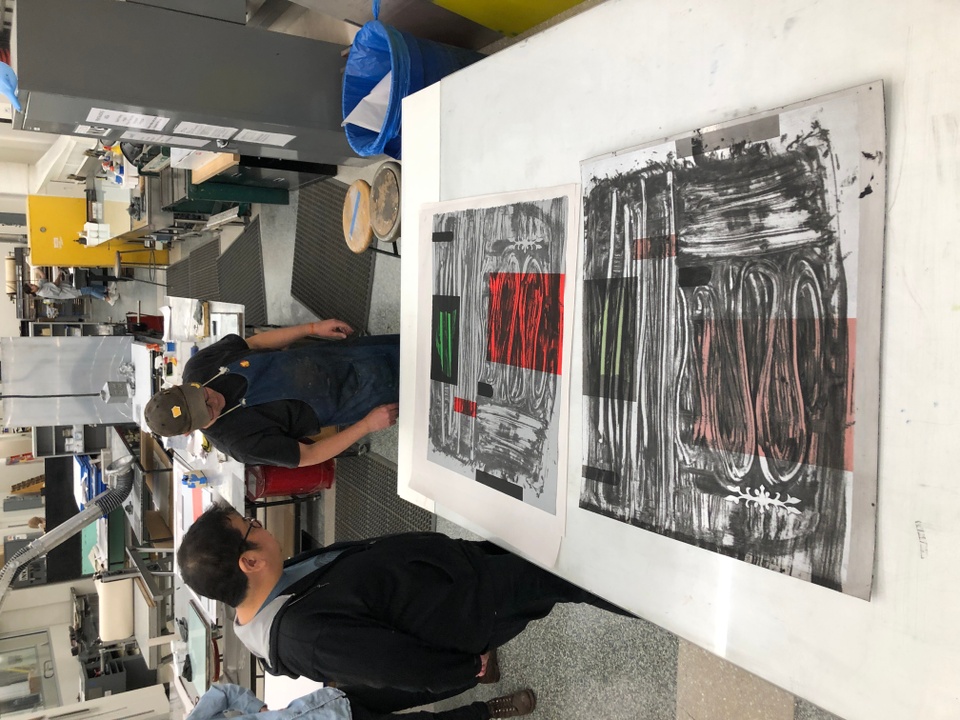 Broad view of artist working in the print shop at Island Press