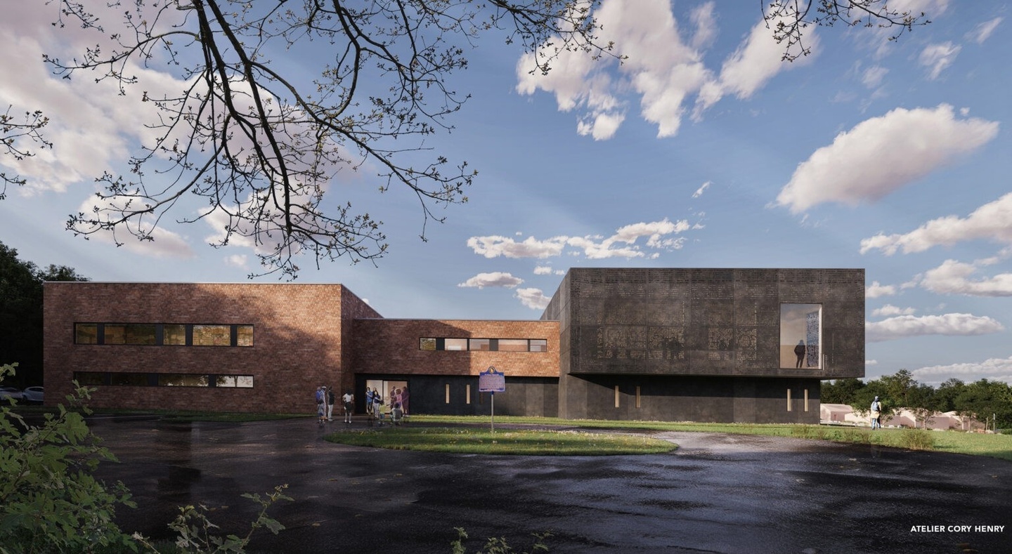 rendering of a brick building complex with blue skies in the background, a circle drive and green space 