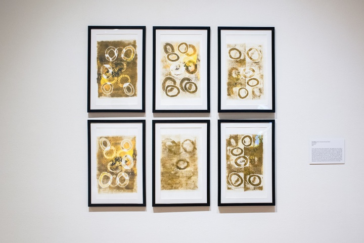 Grid of six images in gold and yellow made of relief printed circular designs.